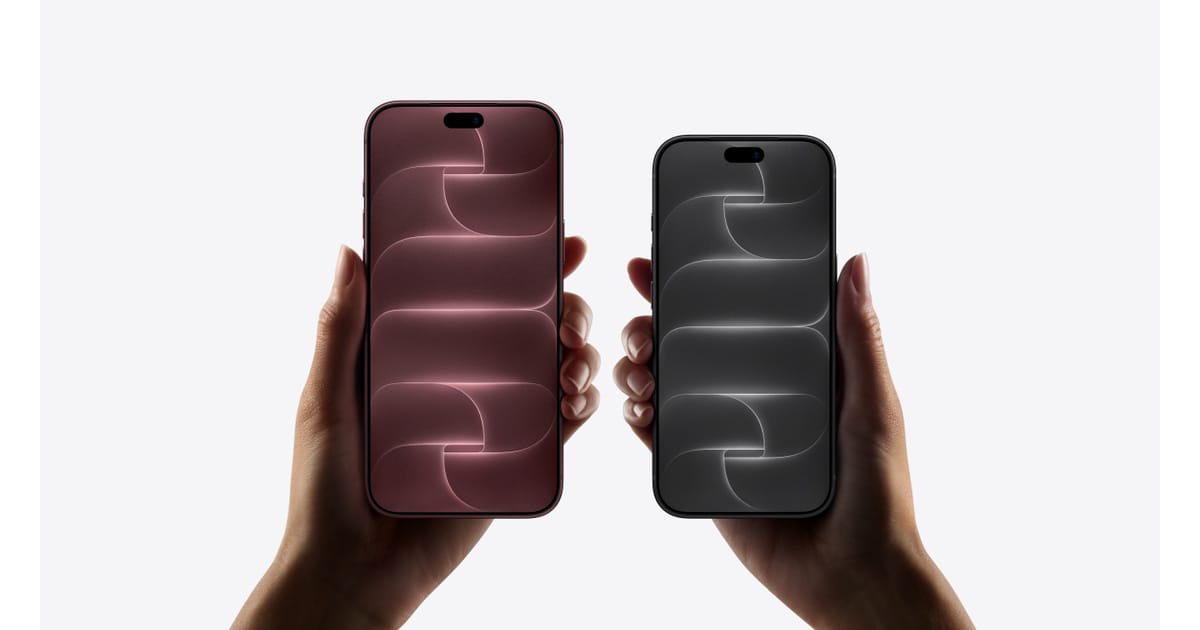 Due iPhone 18 Pro tenuti in mano, uno rosso scuro e uno nero