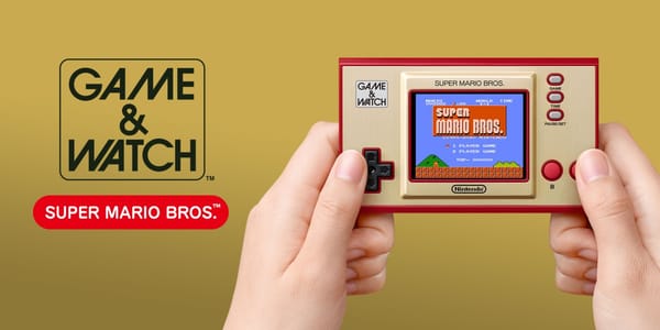 La console Game & Watch: Super Mario Bros. dorata mostra il gioco e i suoi comandi
